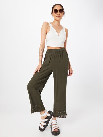 ABOUT YOU Loose fit Trousers 'Carlene' in Green