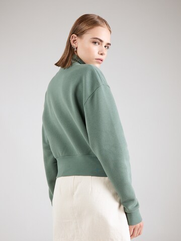 LEVI'S ® Sweatshirt 'Graphic Sara 1/4 Zip' in Groen