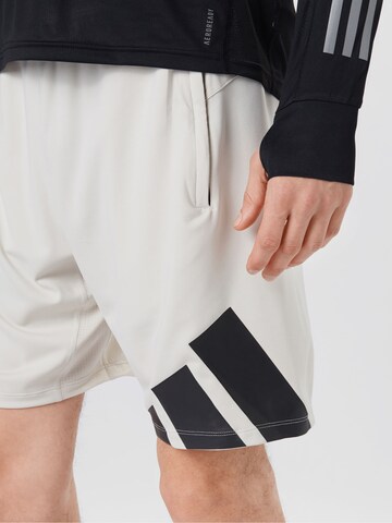 regular Pantaloni sportivi di ADIDAS PERFORMANCE in beige