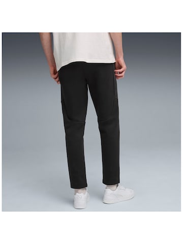 regular Pantaloni sportivi 'Puma Evostripe Pants Dk' di PUMA in nero