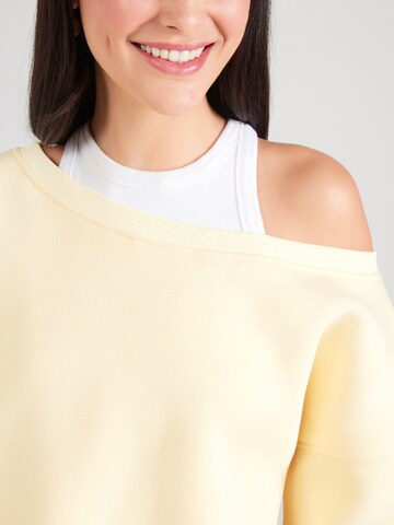 Sweat-shirt 'Asta' ABOUT YOU en jaune