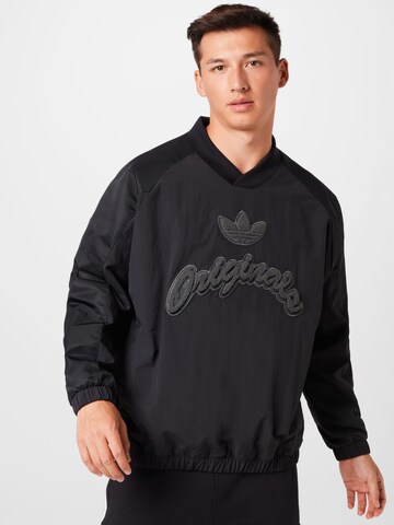 ADIDAS ORIGINALS Sweatshirt in Black: front