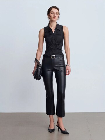Dilvin Flared Leggings 'Gamaschen' in Zwart