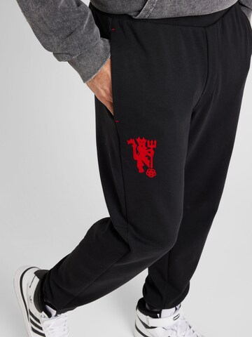 ADIDAS PERFORMANCE Tapered Sportbroek 'Manchester United Cultural Story' in Zwart