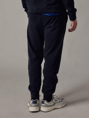 OWN Off With Nature Regular Hose 'Joggers'‌‌ in Blau