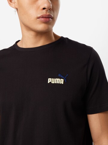 PUMA Sportshirt 'Ess+' in Schwarz