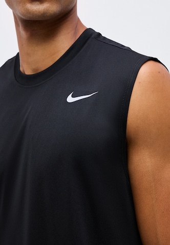 NIKE Funkcionalna majica | črna barva