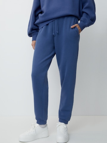 Pull&Bear Tapered Trousers in Blue: front