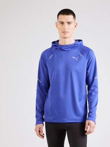 PUMA Spordidressipluusid 'Run Grid', värv sinine: eest vaates