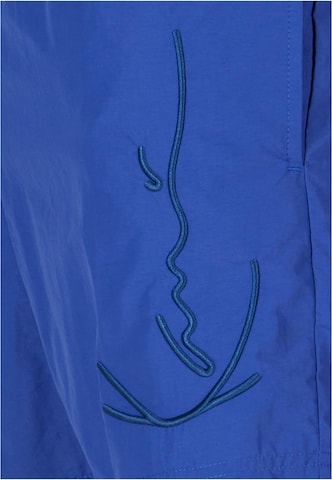 Karl Kani Swim Trunks in Blue