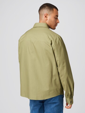 ABOUT YOU x Kevin Trapp Regular fit Button Up Shirt 'Domenic' in Green