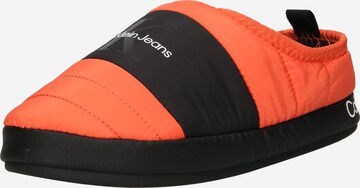 Calvin Klein Jeans - Pantufa em laranja: frente