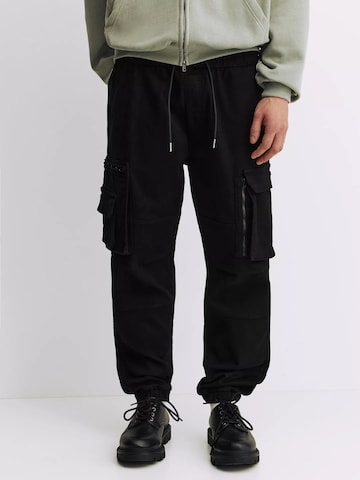 Effilé Pantalon cargo Pull&Bear en noir : devant