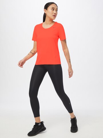 NIKE Performance shirt 'City Sleek' in Orange
