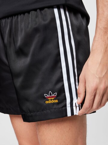 ADIDAS ORIGINALS Regular Trousers in Black