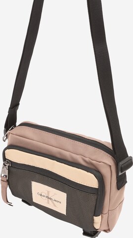 Calvin Klein Jeans Crossbody bag in Beige: front