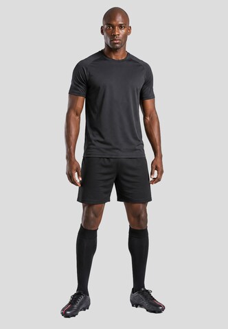 Scarpa da calcio 'Tocco VI Team' di UMBRO in nero
