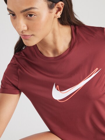 NIKE - Camiseta funcional 'ONE SWSH' en rojo