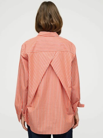 Maglietta ' gaia ' di moshi moshi mind in arancione