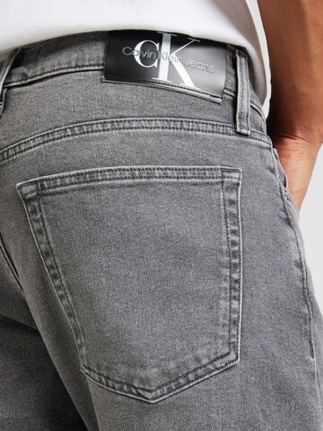 Calvin Klein JeansSlimfit Traperice - siva boja