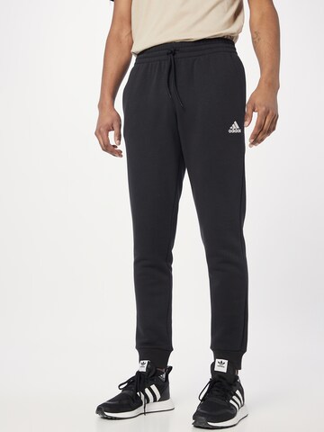 ADIDAS SPORTSWEAR Дънки Tapered Leg Спортен панталон 'Essentials' в черно: отпред