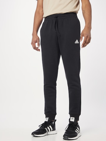 ADIDAS SPORTSWEAR Zúžený Sportovní kalhoty 'Essentials Fleece Tapered Cuffed' – černá: přední strana