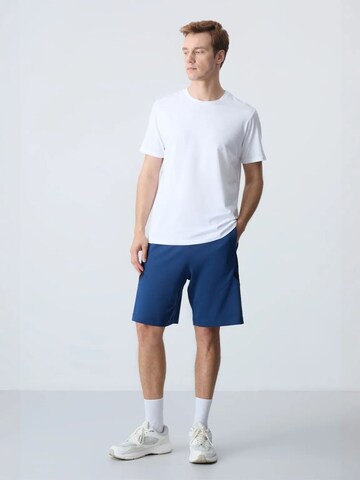 Regular Pantalon Tommy Life en bleu