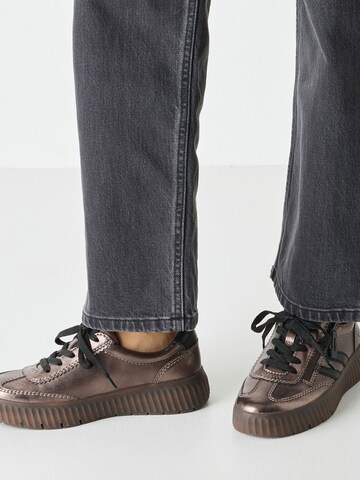 Baskets basses Tamaris en or