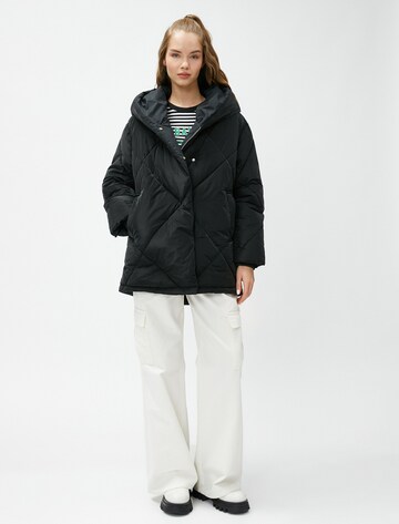 Koton Winter Jacket in Black: front
