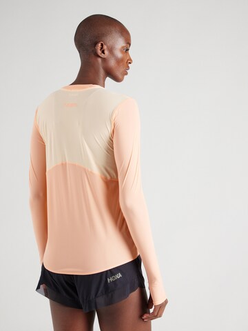Maglia funzionale 'AIROLITE' di HOKA in arancione