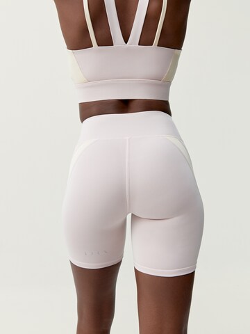 Skinny Pantalon de sport 'Latika' Born Living Yoga en beige