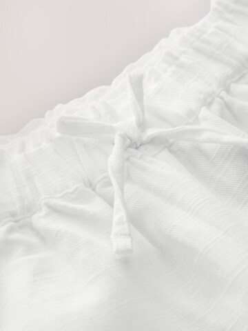 Next - Pierna ancha Pantalón en blanco
