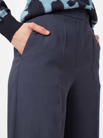 HUGO Zvonové kalhoty Kalhoty s puky 'Halasa' – modrá