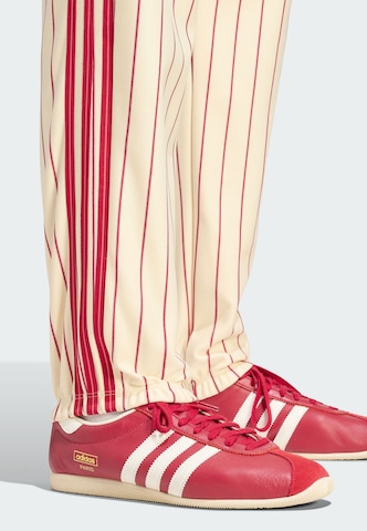 Tapered Pantaloni 'Firebird' di ADIDAS ORIGINALS in beige