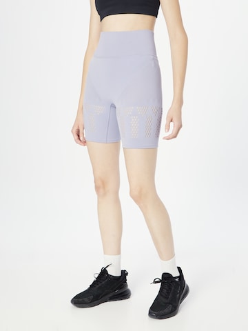 Skinny Pantalon de sport NIKE en violet : devant