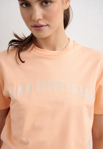 Aim'n - Camisa funcionais 'Varsity' em laranja