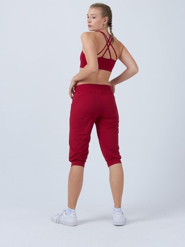 SPORTKIND Loosefit Sporthose 'Caprihose mit Taschen'‌‌‌‌‌ in Rot