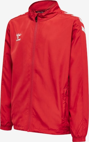 Veste de sport 'hmlCORE XK MICRO ZIP JACKET KIDS' Hummel en rouge : devant