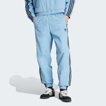 ADIDAS ORIGINALS Tapered Broek 'Adicolor Firebird' in Blauw: voorkant