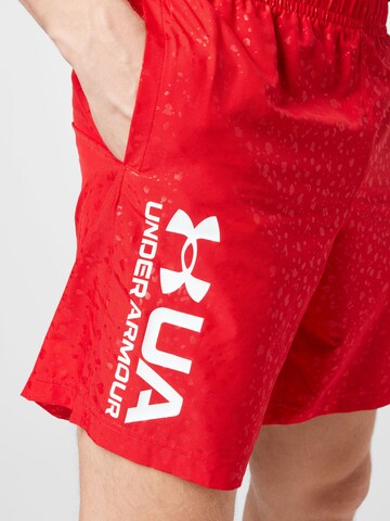 UNDER ARMOUR Regular Sports trousers in Red