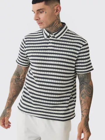 Maglietta 'UNICORN Men's tall striped polo with texture s m' di UNICORN in nero: frontale
