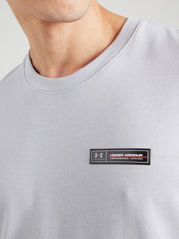 Maglia funzionale di UNDER ARMOUR in grigio