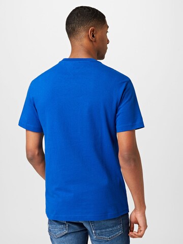 Tommy Jeans T-shirt 'Classic' i blå