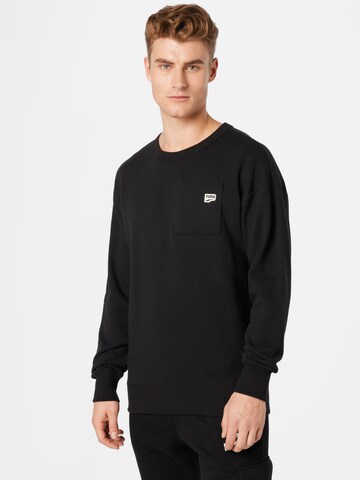 PUMA Sweatshirt 'Downtown' in Zwart: voorkant