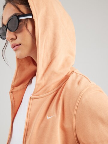 Veste de survêtement Nike Sportswear en orange
