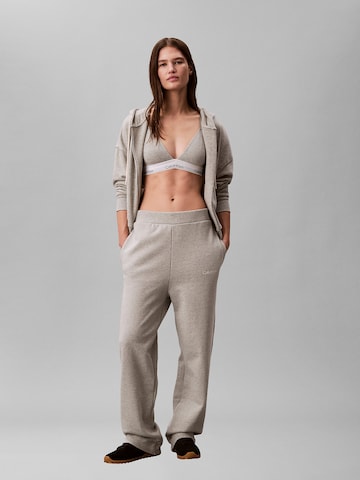 Loosefit Pantalon de sport Calvin Klein Sport en gris : devant