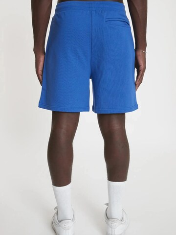 YSPT Studio Regular Sporthose 'Limitless' in Blau