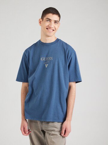T-Shirt GUESS Originals en bleu : devant