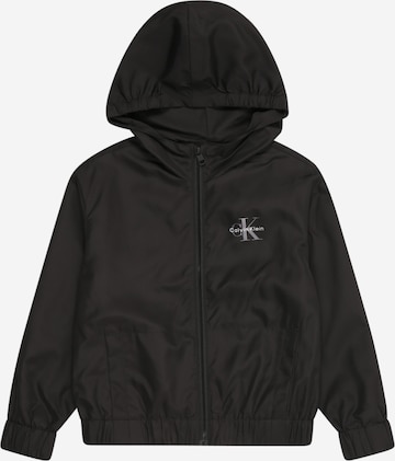 Calvin Klein Jeans Prehodna jakna 'ESSENTIAL' | črna barva: sprednja stran