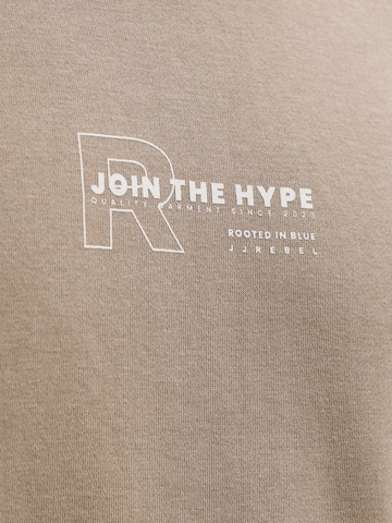 JJ Rebel - Sweatshirt 'JREBZAKI' em castanho